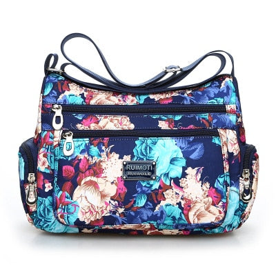 Vintage floral shoulder bag with rural charm. Lightweight, stylish, and practical with multiple zippers—perfect for everyday European & American fashion looks.