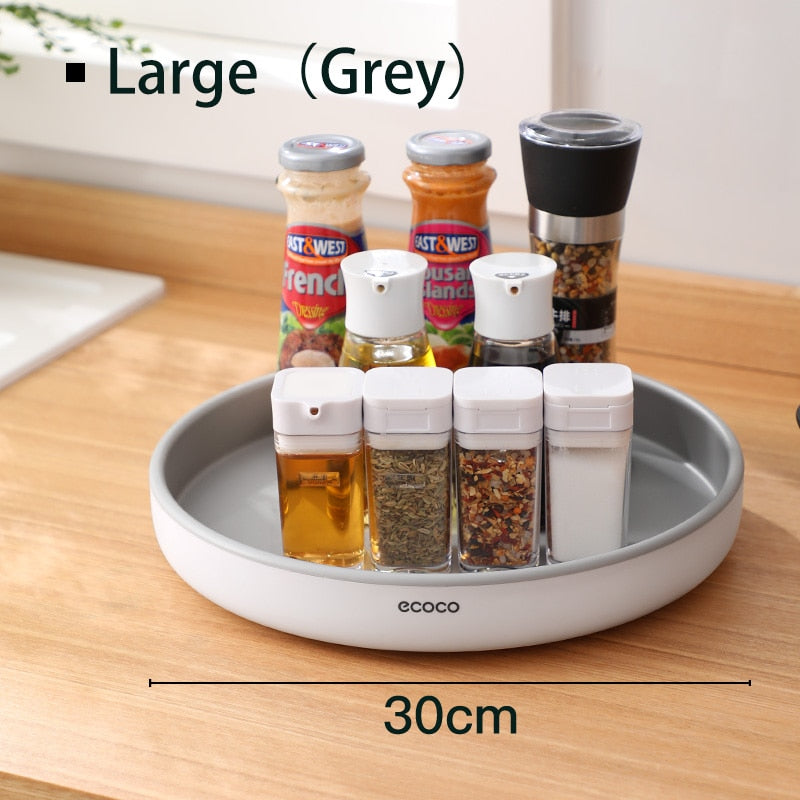 360° rotating seasoning organizer shelf with oilproof, non-slip base. Space-saving kitchen storage rack for spices, bottles, and daily essentials.