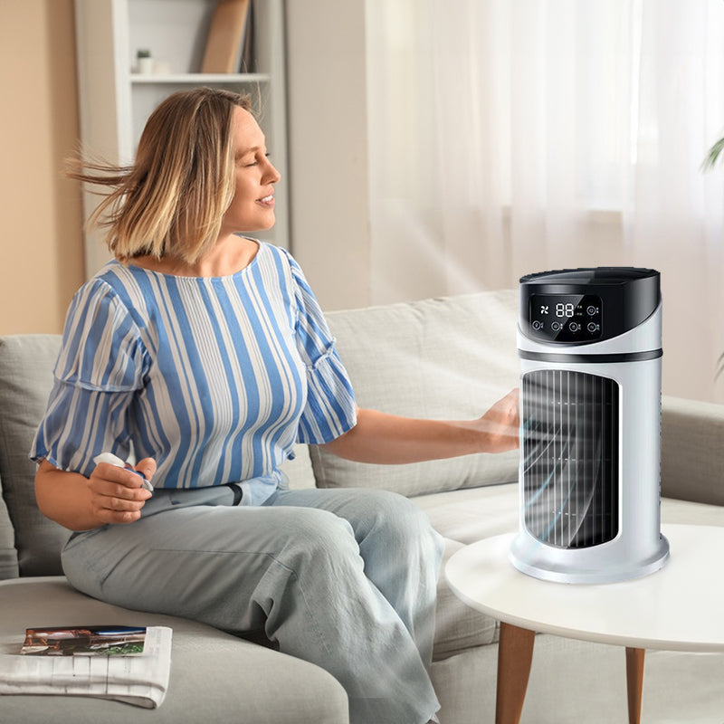 Compact mini USB air cooler with six speed levels, silent operation, and timer function. Bladeless design for safe, efficient personal cooling at home or office.