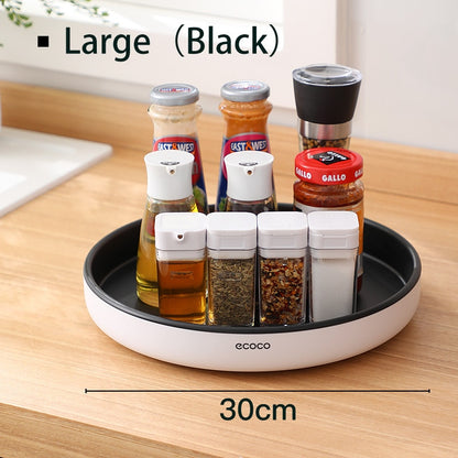 360° rotating seasoning organizer shelf with oilproof, non-slip base. Space-saving kitchen storage rack for spices, bottles, and daily essentials.