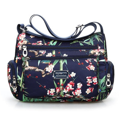 Vintage floral shoulder bag with rural charm. Lightweight, stylish, and practical with multiple zippers—perfect for everyday European & American fashion looks.