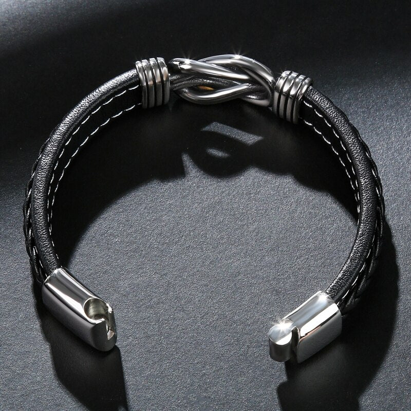 Bold men’s punk leather bracelet crafted with titanium steel. Durable, stylish, and edgy—perfect for daily wear, street fashion, and biker looks.