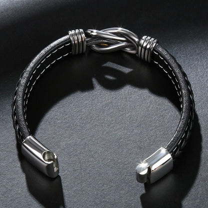 Bold men’s punk leather bracelet crafted with titanium steel. Durable, stylish, and edgy—perfect for daily wear, street fashion, and biker looks.