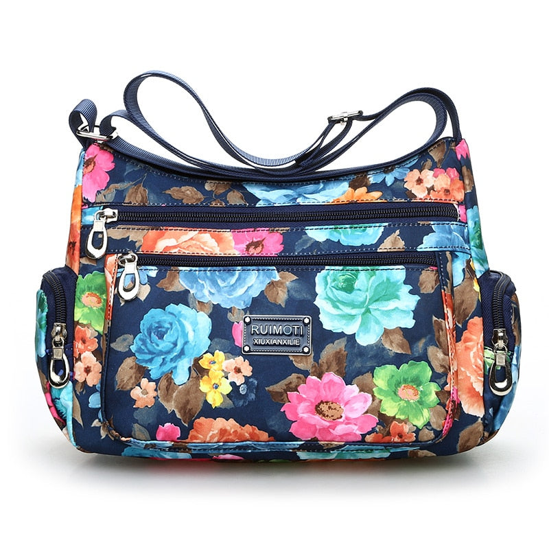 Vintage floral shoulder bag with rural charm. Lightweight, stylish, and practical with multiple zippers—perfect for everyday European & American fashion looks.