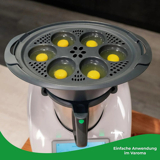 Multifunctional food-grade silicone egg mold and steam basket accessory for Thermomix TM5 and TM6. Ideal for steaming eggs, pastries, and healthy home cooking.