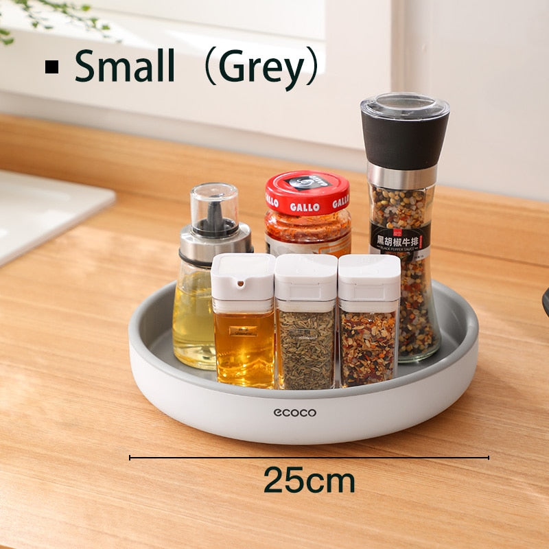 360° rotating seasoning organizer shelf with oilproof, non-slip base. Space-saving kitchen storage rack for spices, bottles, and daily essentials.