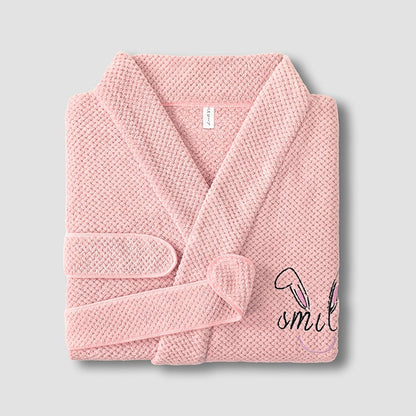 Ultra-soft coral fleece waffle bathrobe for men and women. More absorbent and softer than cotton—perfect for hotel luxury comfort at home.