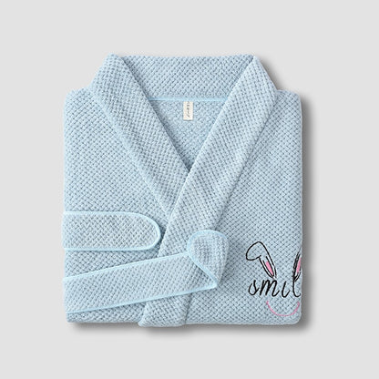 Ultra-soft coral fleece waffle bathrobe for men and women. More absorbent and softer than cotton—perfect for hotel luxury comfort at home.