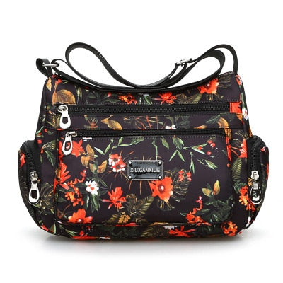 Vintage floral shoulder bag with rural charm. Lightweight, stylish, and practical with multiple zippers—perfect for everyday European & American fashion looks.
