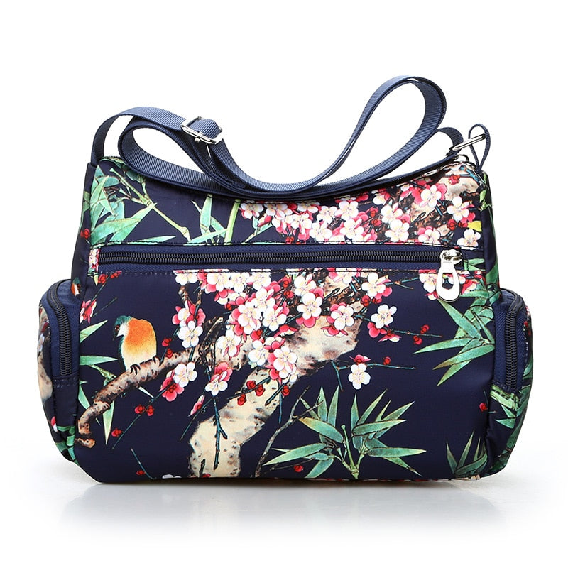 Vintage floral shoulder bag with rural charm. Lightweight, stylish, and practical with multiple zippers—perfect for everyday European & American fashion looks.