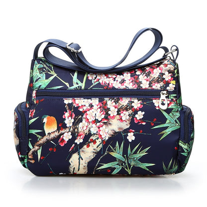 Vintage floral shoulder bag with rural charm. Lightweight, stylish, and practical with multiple zippers—perfect for everyday European & American fashion looks.
