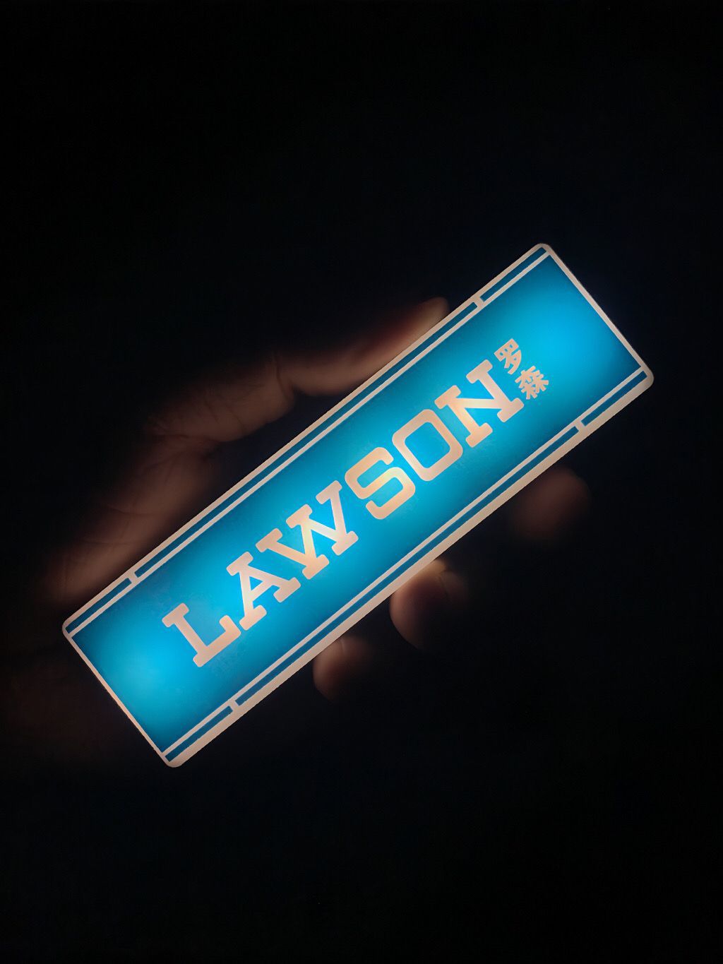 Creative magnetic refrigerator lightbox sticker inspired by convenience stores. Features LED lighting for decorative display and fun collectible use.