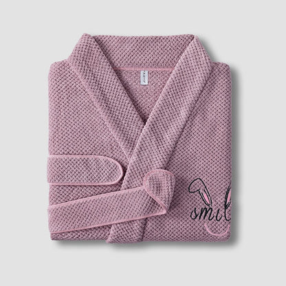Ultra-soft coral fleece waffle bathrobe for men and women. More absorbent and softer than cotton—perfect for hotel luxury comfort at home.