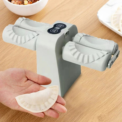 Make perfect dumplings at home with this fully automatic electric dumpling maker. Double-head design for fast, uniform pierogi and dumplings with minimal effort.