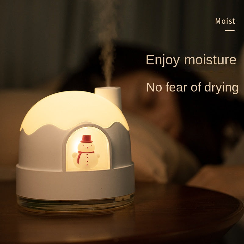Snowy house night light humidifier with silent spray mist. Cute, festive, and soothing—perfect Christmas gift for home, bedroom, or desk use.