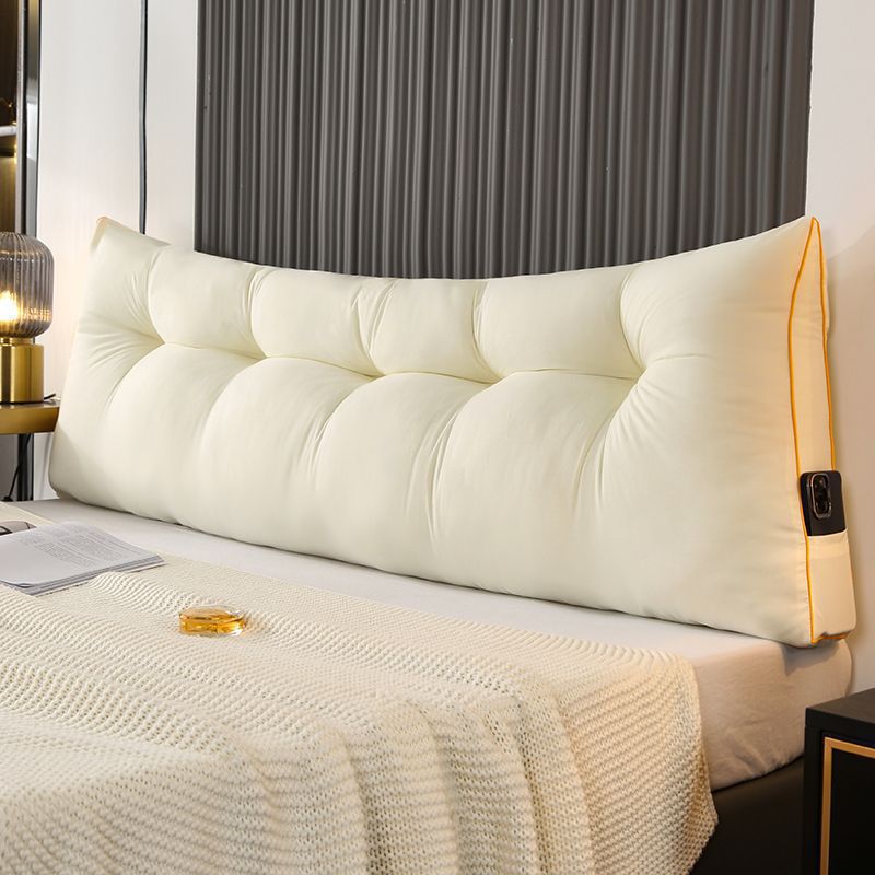 Soft and warm feather-cotton backrest cushion with brushed fabric. Triangular design provides comfortable support for bed, sofa, and reading time.