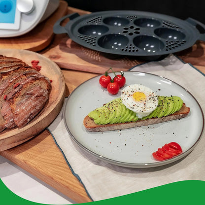 Multifunctional food-grade silicone egg mold and steam basket accessory for Thermomix TM5 and TM6. Ideal for steaming eggs, pastries, and healthy home cooking.