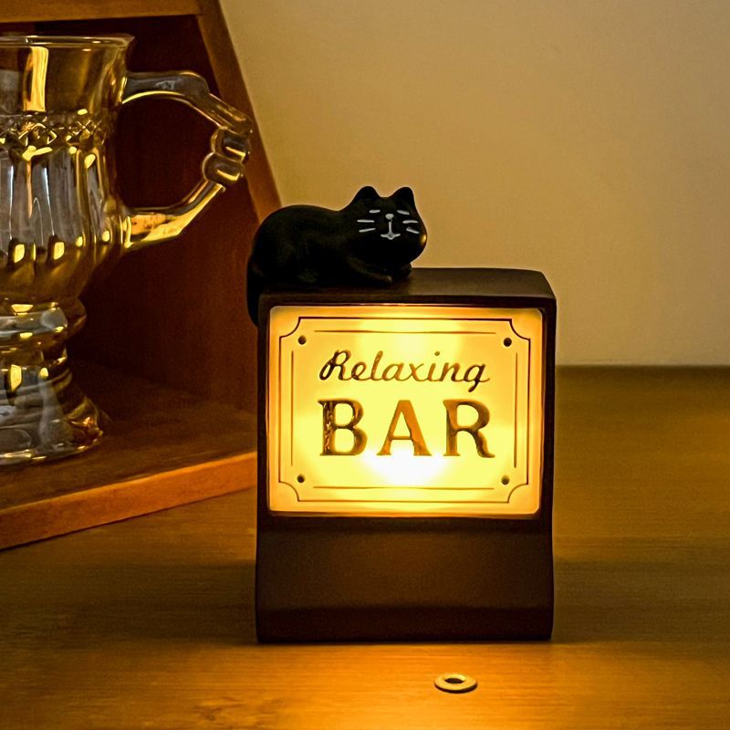 Creative magnetic refrigerator lightbox sticker inspired by convenience stores. Features LED lighting for decorative display and fun collectible use.