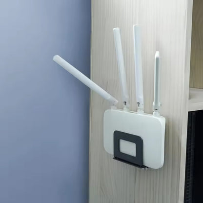 Universal adjustable wall mount for Apple TV, routers, modems, and TV boxes. Space-saving, sturdy, and easy to install—perfect for clean home setups.