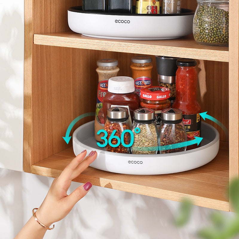 360° rotating seasoning organizer shelf with oilproof, non-slip base. Space-saving kitchen storage rack for spices, bottles, and daily essentials.