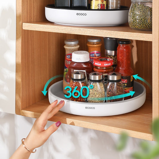 360° rotating seasoning organizer shelf with oilproof, non-slip base. Space-saving kitchen storage rack for spices, bottles, and daily essentials.