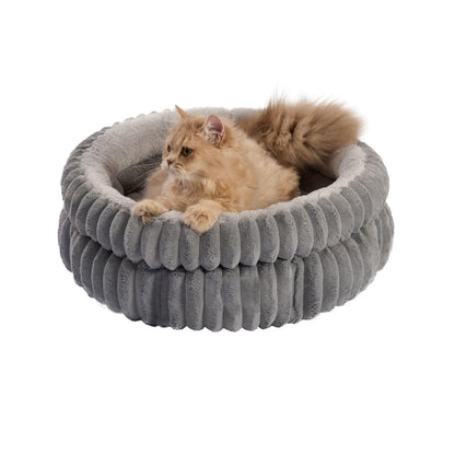 Ultra-soft rabbit fur round pet bed with thick padding. Warm, cozy, and stylish—perfect for small dogs and cats who love comfort and security.