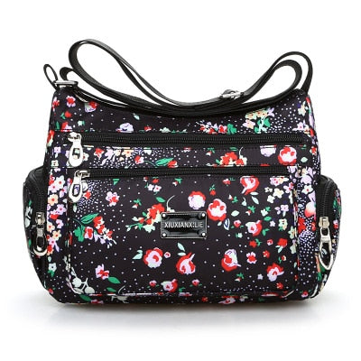 Vintage floral shoulder bag with rural charm. Lightweight, stylish, and practical with multiple zippers—perfect for everyday European & American fashion looks.