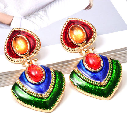 Trendy oiled colorful fashion earrings with a glossy finish. Lightweight, eye-catching, and perfect for everyday wear or special occasions.