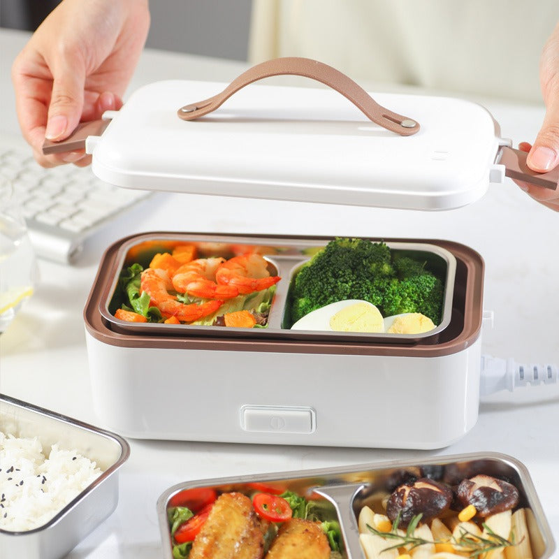 Portable electric lunch box with stainless steel liner for fast heating and steaming. Compact, leak-resistant, and ideal for home, office, and travel meals.