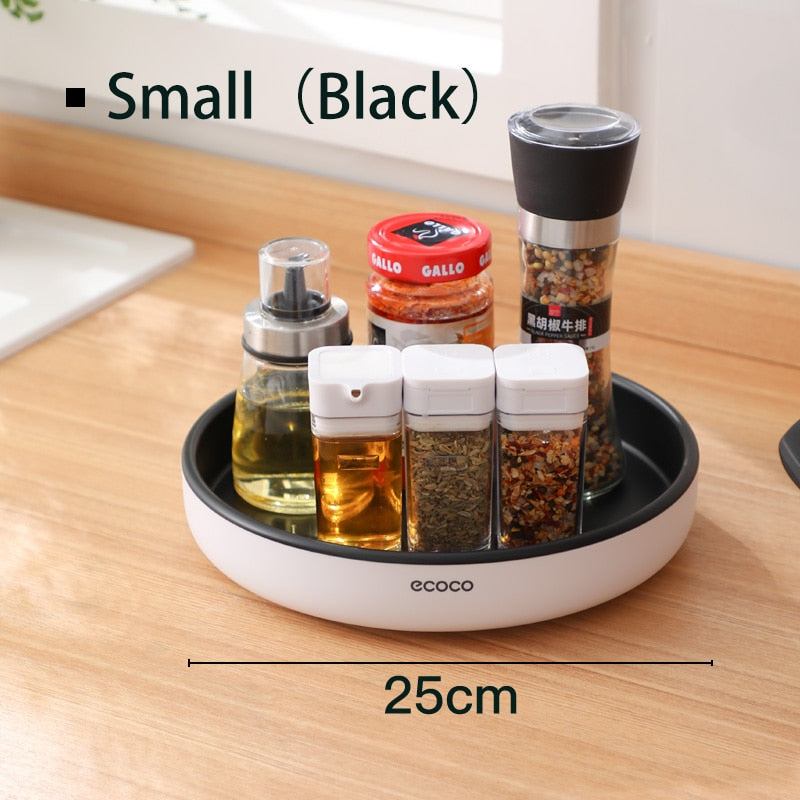 360° rotating seasoning organizer shelf with oilproof, non-slip base. Space-saving kitchen storage rack for spices, bottles, and daily essentials.