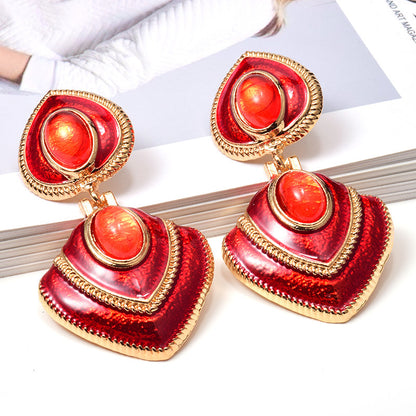 Trendy oiled colorful fashion earrings with a glossy finish. Lightweight, eye-catching, and perfect for everyday wear or special occasions.