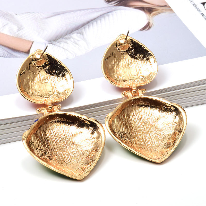 Trendy oiled colorful fashion earrings with a glossy finish. Lightweight, eye-catching, and perfect for everyday wear or special occasions.