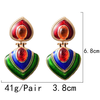 Trendy oiled colorful fashion earrings with a glossy finish. Lightweight, eye-catching, and perfect for everyday wear or special occasions.