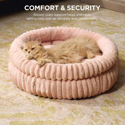 Ultra-soft rabbit fur round pet bed with thick padding. Warm, cozy, and stylish—perfect for small dogs and cats who love comfort and security.