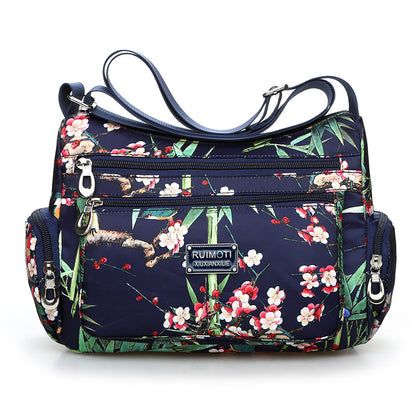 Vintage floral shoulder bag with rural charm. Lightweight, stylish, and practical with multiple zippers—perfect for everyday European & American fashion looks.